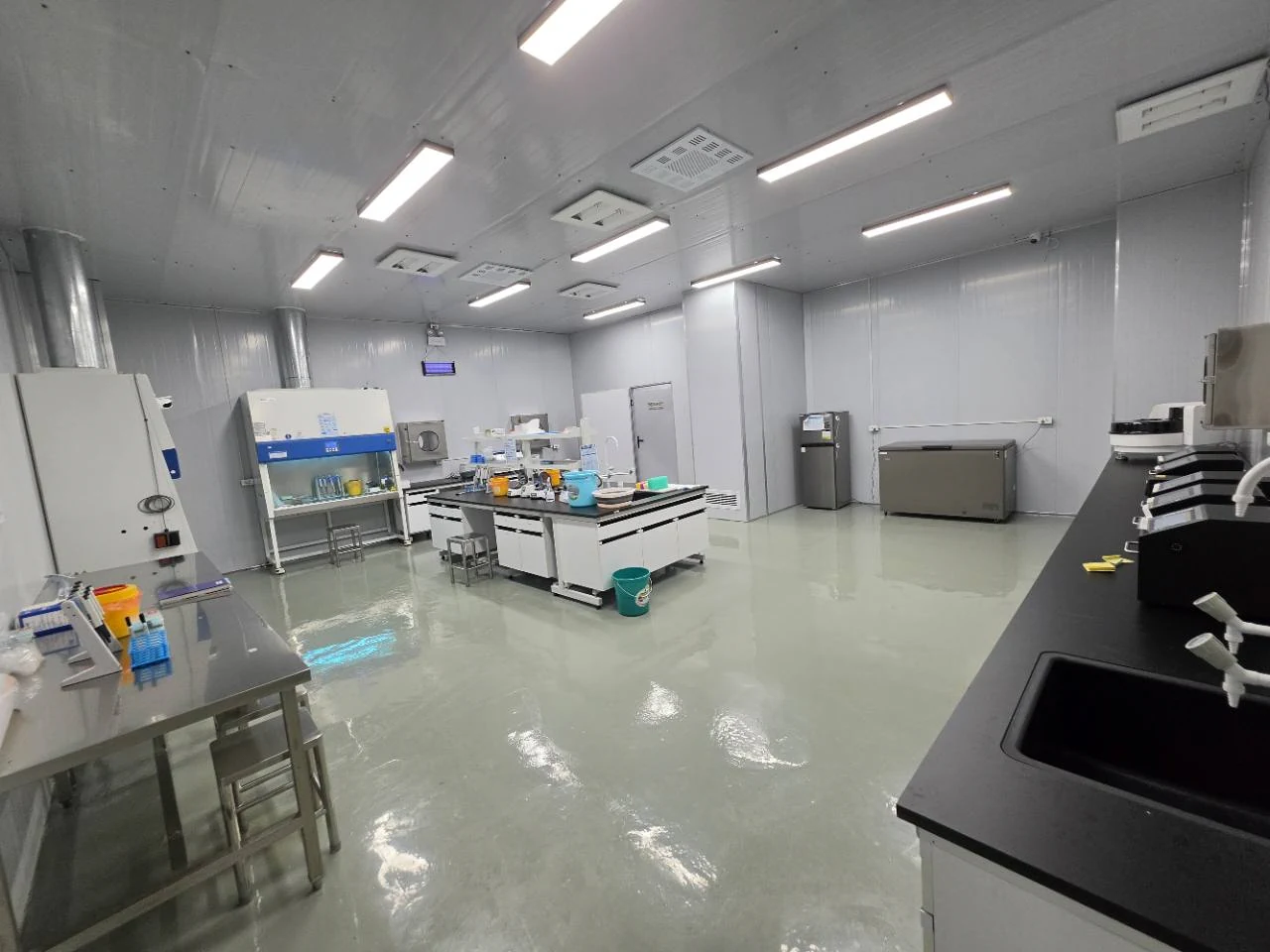 High Hope Vet laboratory with a central workbench and equipment along the walls